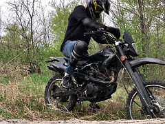 Handsome BIKER RIDING A MOTORCYCLE IN THE FOREST HANDKS AND CUMES IN PUBLIC