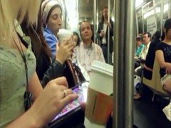Blonde downblouse cleavage on subway train