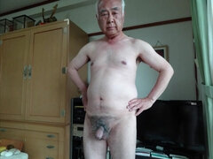 A naked man in Japan exposes the glans