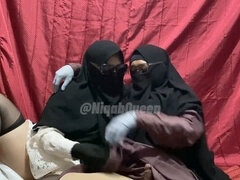 Sensual Niqab-wearing Arab Shemale Engages in a Steamy Girl-on-Girl Encounter