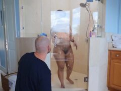 Bald boy relaxes in the bathroom together with curvy black diva