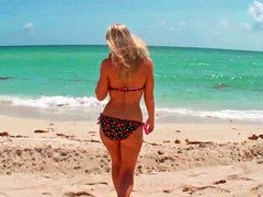Curvy blonde is having a sexy time by the beach