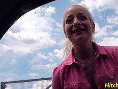 magnificent platinum-blonde hitchhiker rides weenie during her car ride