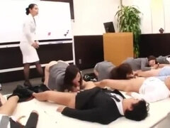 Pleasing oriental whore performing in a wild gangbang XXX scene in public