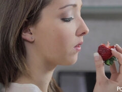 Busty Buffy caresses herself with a strawberry