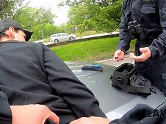 Leanne Lace gets roughed up by the police officer in thiscorruption video