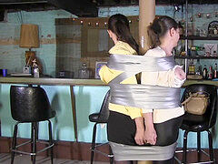 two GIRLS ARE DUCT TAPED AND GAGGED BY ONE gal dame