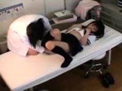 Cute schoolgirl is getting a pussy exam from a horny lesbia