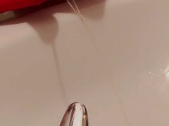 Peeing in the Sink.