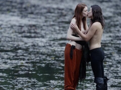 Young Raven Rockette and Bree Daniels engaged in lesbian sex on a raft in a lake